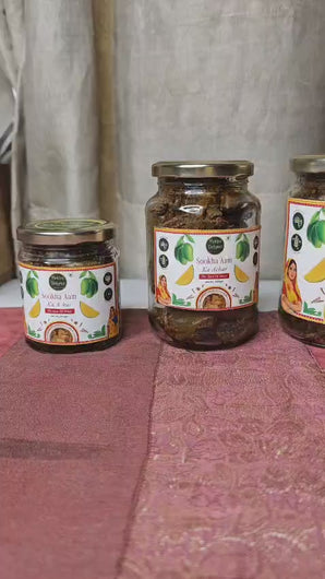 Different-sized bottles of Sookha Aam pickle are available 